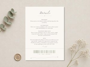 A cream-colored "Details" card with event information and a gray marathon route graphic at the bottom is on a white surface with a wax seal.
