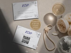 Two RSVP cards displayed on a table next to a glass of champagne, pearls, and a disco ball.
