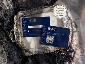Two dark blue RSVP cards displaying moon phase designs, placed on an ornate silver tray.