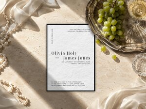 Editorial wedding invitation with black tie typography, high-contrast fashion lettering, formal monochrome styling and a timeless sophisticated finish