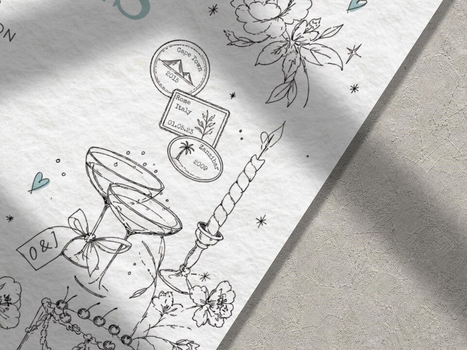 A close-up of a wedding invitation shows line art illustrations of champagne glasses, a candle, flowers, and three passport stamps.