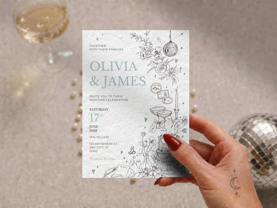 A hand holds a wedding invitation with travel-themed line art, featuring text for "Olivia & James" and event details.