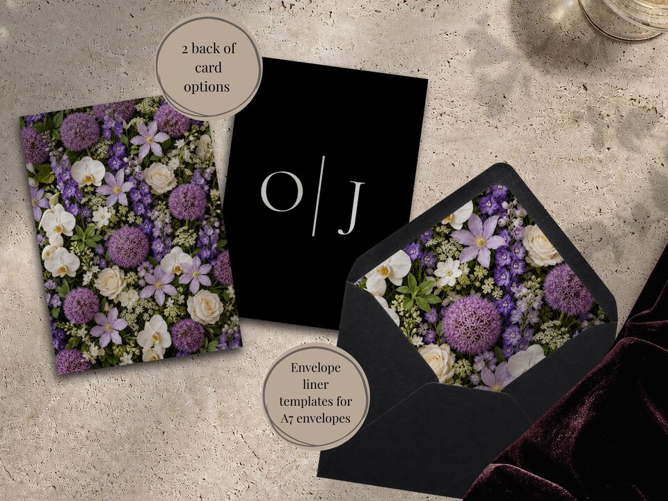 A flat lay shows a floral card, a black card with monogram initials, and a black envelope with a floral liner on a textured stone surface.