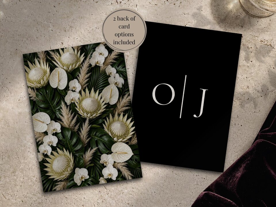 Two back of card options shown side by side, one covered in tropical flowers and the other black with white monogram letters.