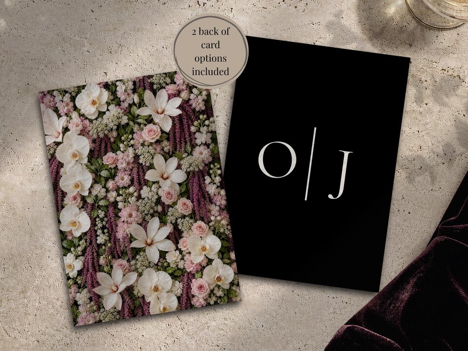 Two wedding stationery cards laid side by side, one covered in dense white and pink floral patterns and the other solid black with monogram letters.