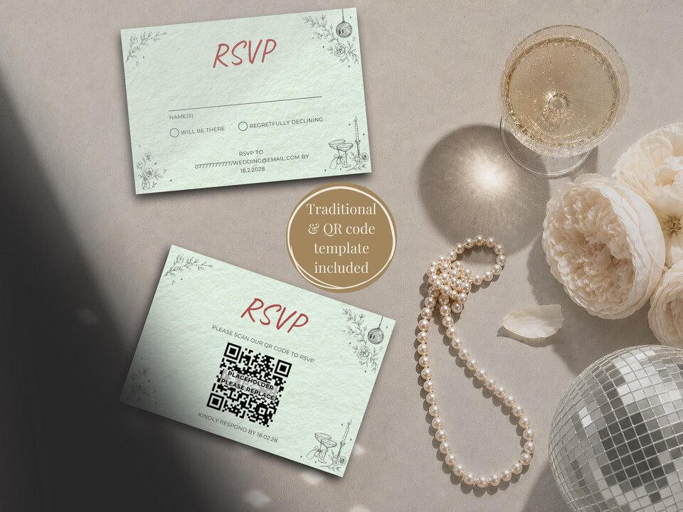 Flat lay of two light green RSVP cards with red text next to pearls, a glass of champagne, and a small disco ball.