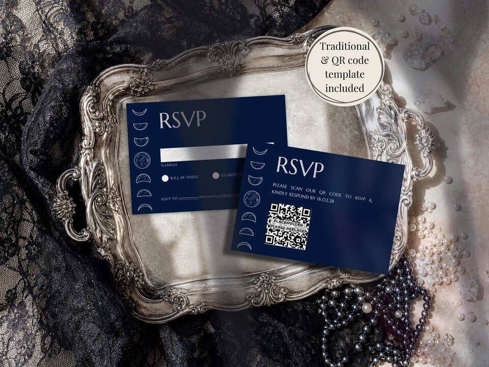 Two dark blue RSVP cards displaying moon phase designs, placed on an ornate silver tray.