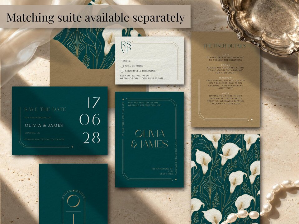 An arrangement of a matching wedding stationery suite including an invitation, save the date, RSVP card, and details card on a stone surface.