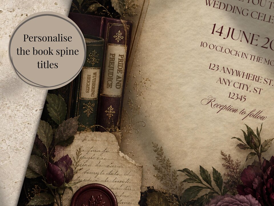 A close-up view of the wedding invitation displays miniature books with legible text on their spines next to dark burgundy roses.