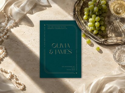 Art Deco Wedding Invitation featuring a deep emerald green background with metallic gold typography, curved geometric linework, corner diamonds and an Art Deco initials monogram; editable Canva template with refined typography and personalised wedding details.